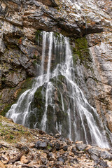 Waterfall flowing out of the rock