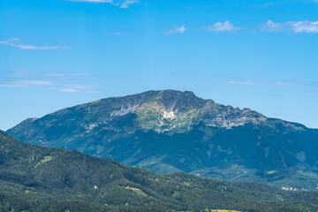 Beautiful view of the Ötscher peak in Lower Austria from Bürgeralpe near Mariazell on a sunny summer day with blue sky cloud, Styria, Austria - 516189703
