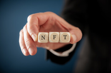 NFT spelled on wooden dice