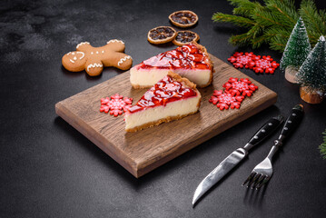 Delicious christmas strawberry tart on concrete background, top view, copy space