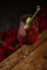 cocktail with ice and lemon on the table