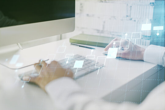Multi exposure of abstract creative financial chart with hand typing on computer keyboard on background, research and analytics concept