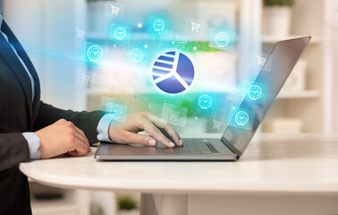 Businessman working on laptop with new business