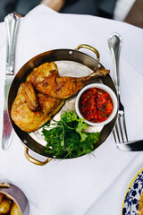 tobacco chicken roasted on coals