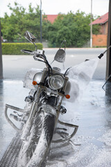 Motorcycle. Car Wash. Motorcycle cleaning with foam injection. Make more clean.