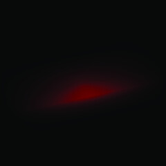 Dark background with surface slightly illuminated at center