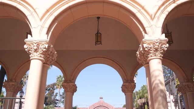 Spanish colonial revival architecture, Balboa Park, San Diego, California USA. Historic building, classic baroque or rococo romance style. Arches and columns of Casa, archway, vault, arcade or passage