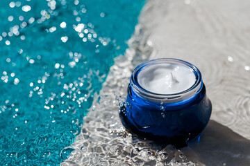 Moisturising beauty cream, skincare and spa cosmetics by swimming pool in summer, cosmetic product...