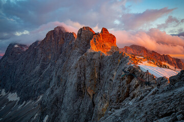 Summer sunrise in the Alps on the top of the Dachstein 3000 m.