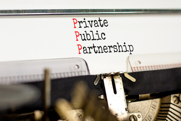 PPP private public partnership symbol. Concept words PPP private public partnership typed on old...