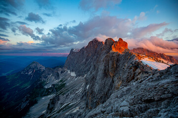 Fototapeta na wymiar Summer sunrise in the Alps on the top of the Dachstein 3000 m.