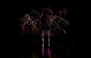 Fireworks above the water surface