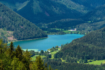 Beautiful aerial view of Erlauf lake (Erlaufsee) from Bürgeralpe near Mariazell on a sunny summer day, Styria, Austria - 516209948
