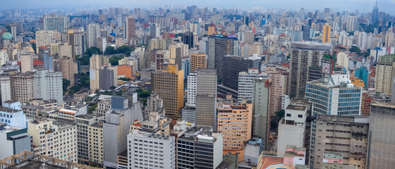 Aerial view of several tall business and residential buildings in Sao paulo city center.