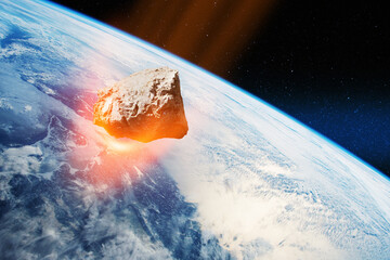 Planet Earth and big asteroid in the space. Potentially hazardous asteroids. Asteroid in outer space near Earth planet. Elements of this image furnished by NASA. © hamara