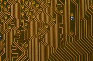 microprocessor on the background of the microcircuit of the motherboard.