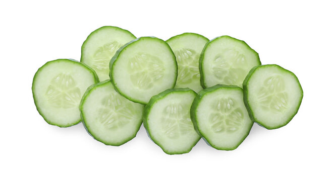 Slices of fresh ripe cucumber isolated on white, top view