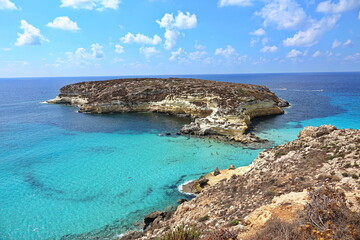 Fototapeta premium View of the most famous sea place of Lampedusa, Rabbits Beach or Conigli island. LAMPEDUSA, ITALY - AUGUST, 2019