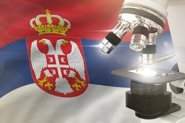 Microscope on Serbia flag background - science development concept. Research in genetics or microbiology 3D illustration of object