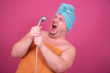 Morning. Funny fat man after a shower. 
