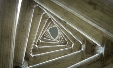 Endless tunnel optical illusion, multiple triangles in torsion effect. Inside view of the clock...