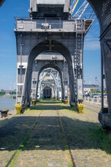 Fototapeta premium Old harbor crane on the Scheldt quays in the port of Antwerp (Belgium)