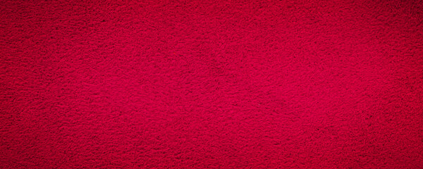 Fototapeta premium Red suede genuine leather background. Velvet red background close-up photo.