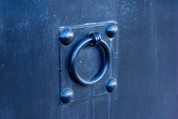 Old door with iron knocker