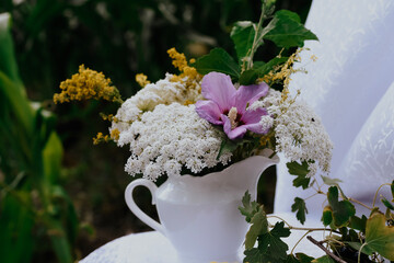 bouquet of rustic flowers in a vase
