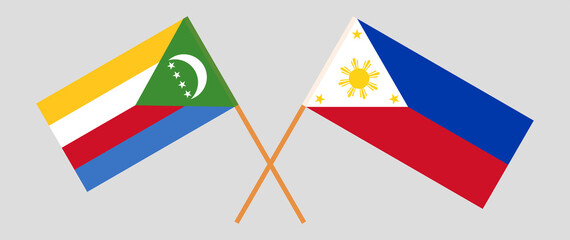 Crossed flags of the Comoros and the Philippines. Official colors. Correct proportion