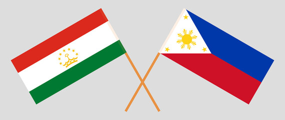 Crossed flags of Tajikistan and the Philippines. Official colors. Correct proportion