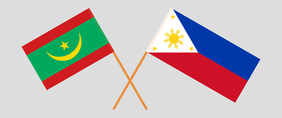 Crossed flags of Mauritania and the Philippines. Official colors. Correct proportion