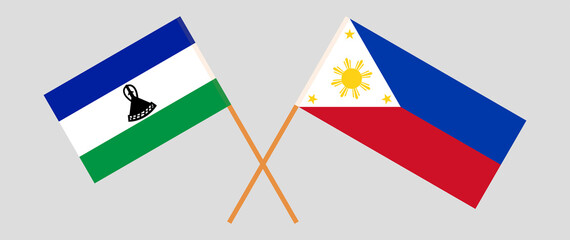 Crossed flags of Lesotho and the Philippines. Official colors. Correct proportion
