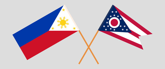 Obraz premium Crossed flags of the Philippines and the State of Ohio. Official colors. Correct proportion