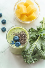 Energy green smoothie with kale, chia and pineapple. Colon cleansing smoothie
