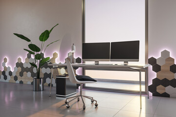 Perspective view on stylish work place with modern computers in light interior office with glossy...