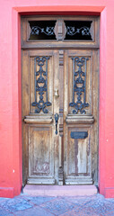 Fototapeta na wymiar Old door with iron knocker