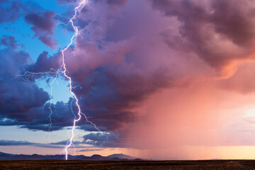 Thunderstorm with lightning and sunset sky