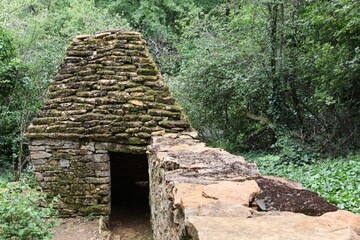 Old and typical stone hut called cadole in french language in Beaujolais, France	