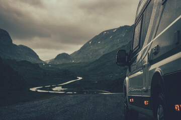 Camper Van RV on a Rainy Scandinavian Road
