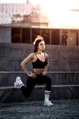 beautiful brunette working out on stairs