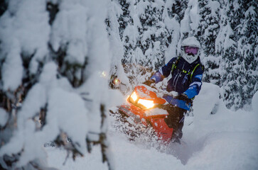 Alaska snowmachine rider in the backcountry 