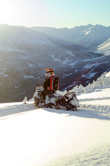 Alaska snowmachine rider in the backcountry 
