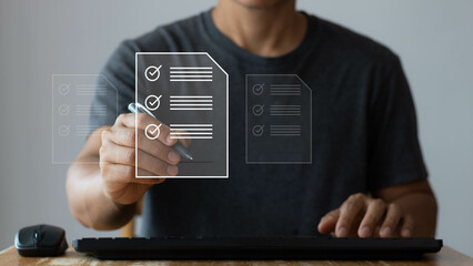 Online business contract Electronic signature and paperless office. Man uses a pen to sign electronic documents on digital documents on a virtual screen. e-signing. Technology and document management.