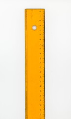 yellow ruler on a white background