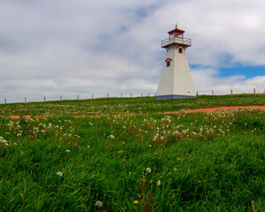 lighthouse on the hill of flowers