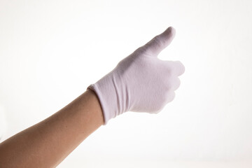 Hands gesticulating in white textile gloves on a white background