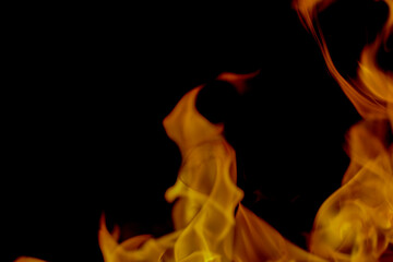 Abstract blur of Fire flames on black background. Burning power.