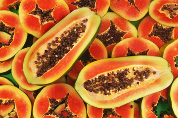 Red papaya slices close up