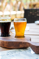 two glass of beer on wooden table